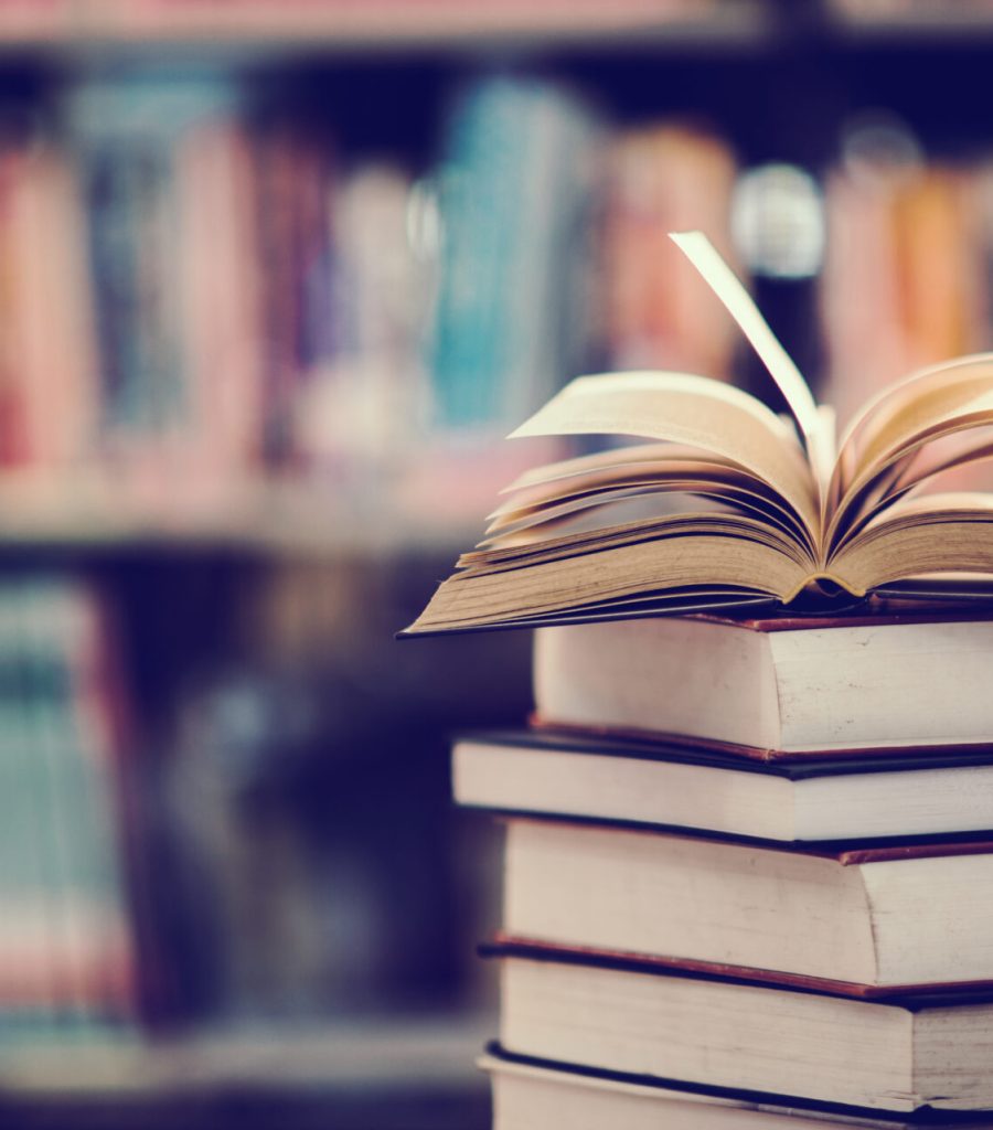 Book in library with open textbook,education learning concept Book in library with open textbook,education learning concept